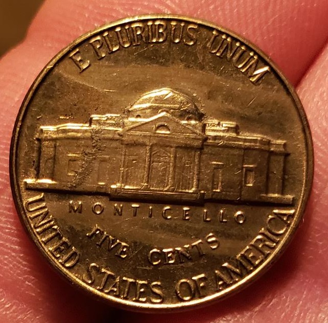 Unidentified-Schmutz-On-My-1959-Jefferson-Nickel
