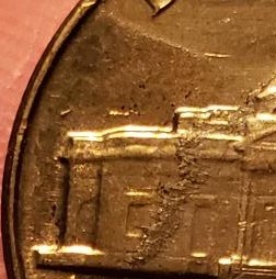 Unidentified-Schmutz-On-My-1959-Jefferson-Nickel