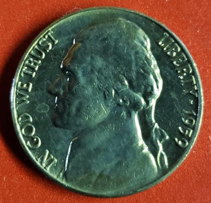 Unidentified-Schmutz-On-My-1959-Jefferson-Nickel