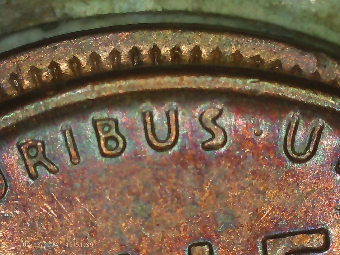 1955-1c-Mated-To-What-Appears-To-Be-An-Indian-Head-Penny