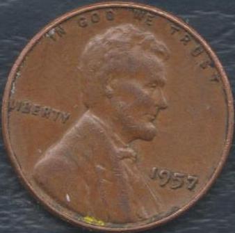 1957-Cent-With-Staple---In-It