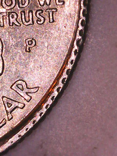2000-Quarter-With-Collar-Clash