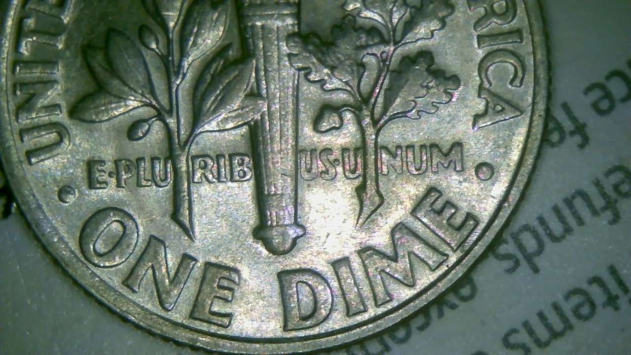 1977-Dime.-I'm�thinking-Machine-Doubling-But-Possible-DDR-And-Lettering-On-Obverse-Just-Looks-Odd