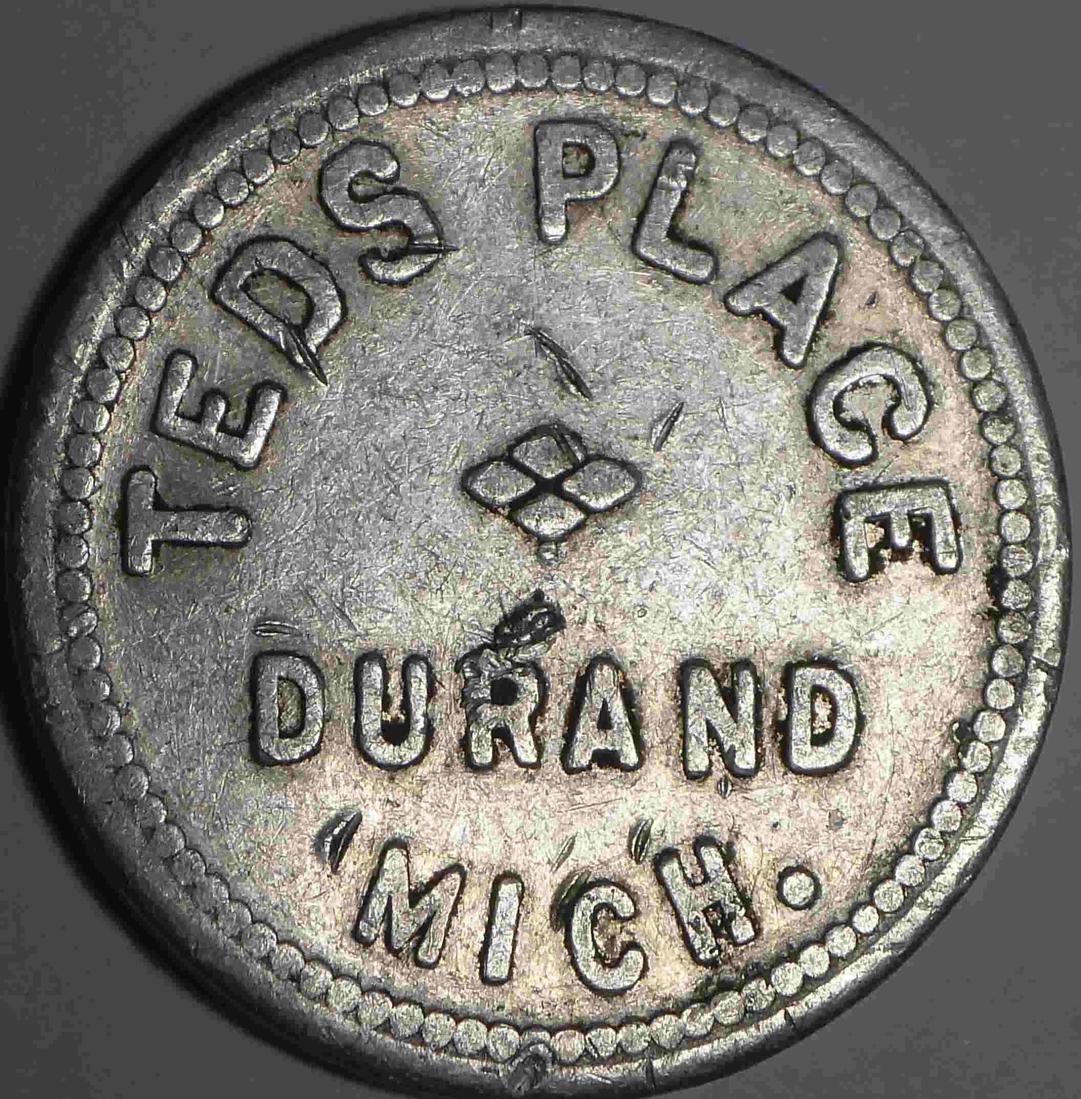 A-25c-Aluminum-Token-From-Teds-Place-In-Durand,-Mi.-Opinions-Appreciated-: