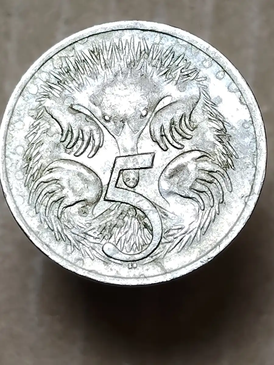 1975-5-Cent-Coin-With-Multiple-Blobs
