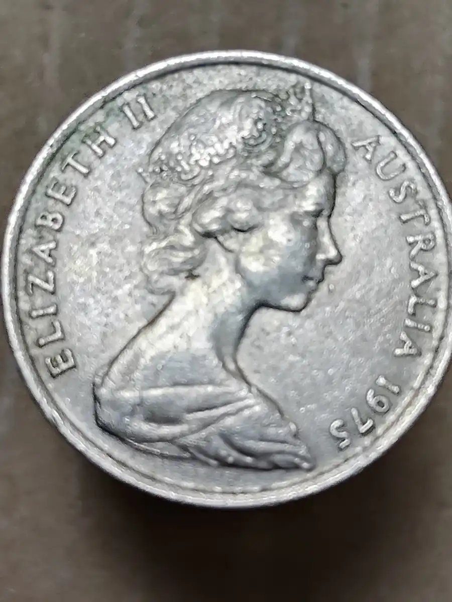 1975-5-Cent-Coin-With-Multiple-Blobs