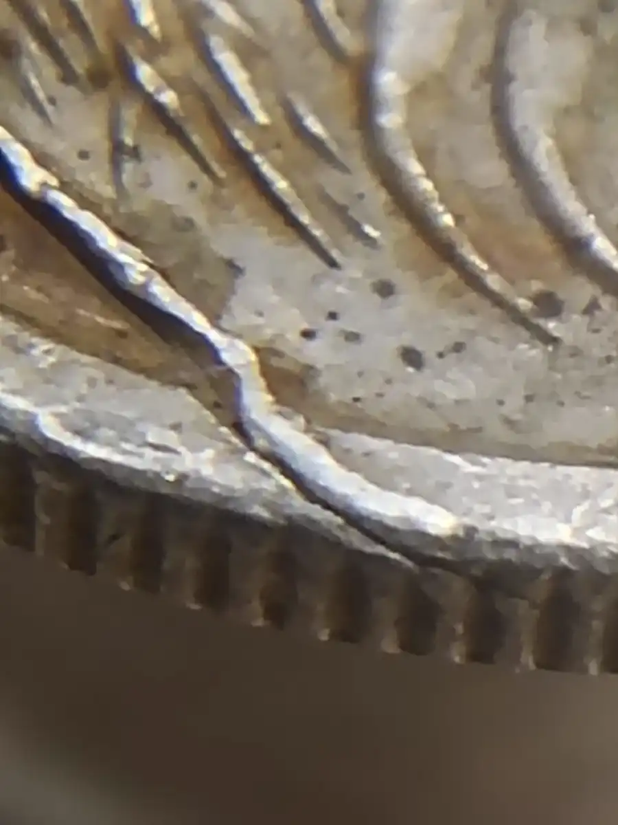 2001-5c-Coin-With-A-Line-Across-It