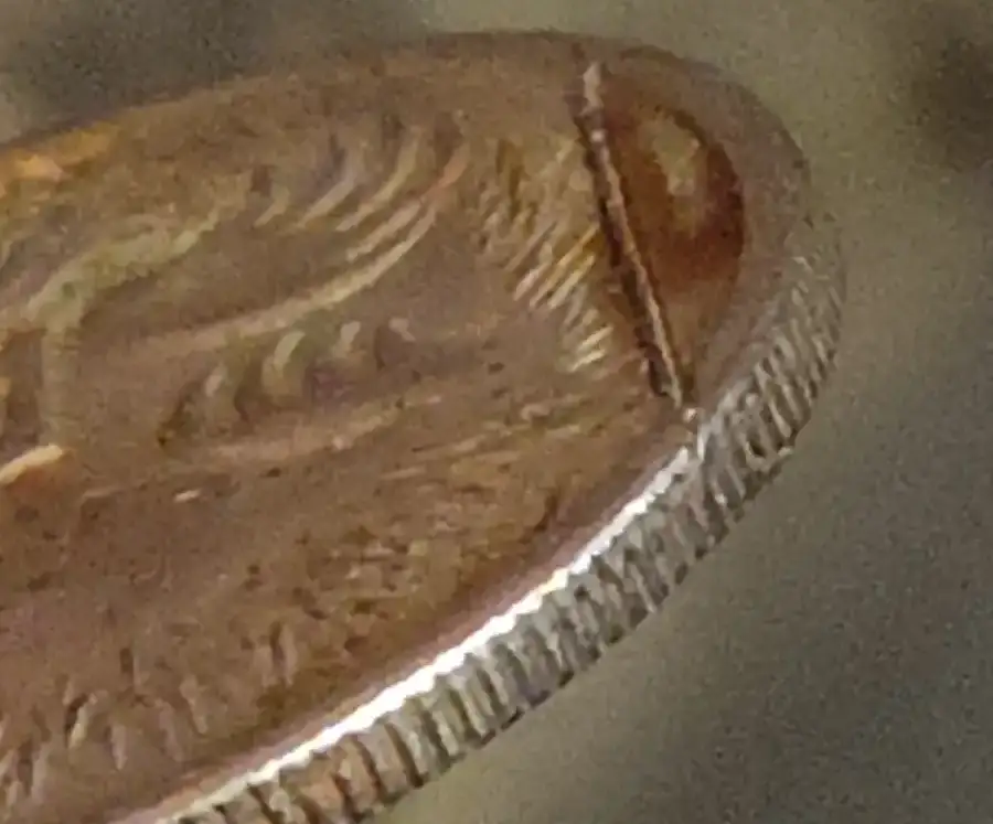 2001-5c-Coin-With-A-Line-Across-It