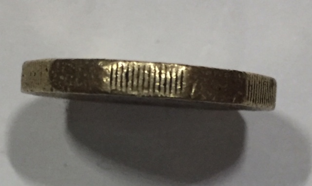 A-Couple-Of-GB-£1-Coins-With-Errors