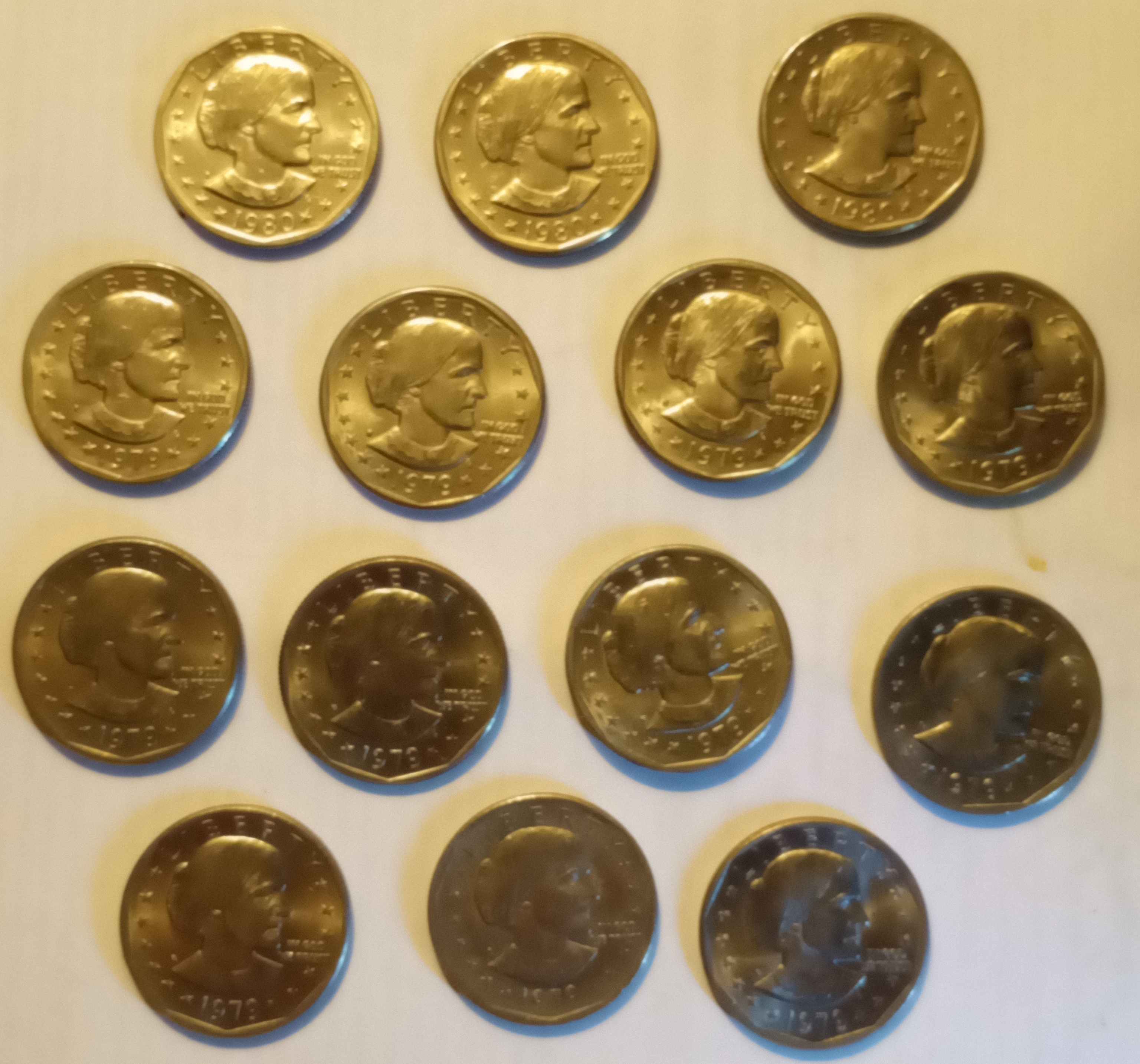 Collection-Of-Wheat-Pennies-And-SBA-Dollars