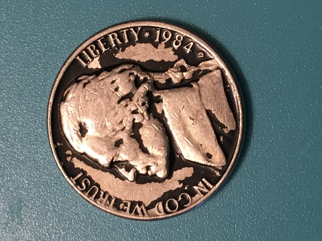 Awesome-Front-And-Back-Of-A-1984-D-Black-Coated-Nickel