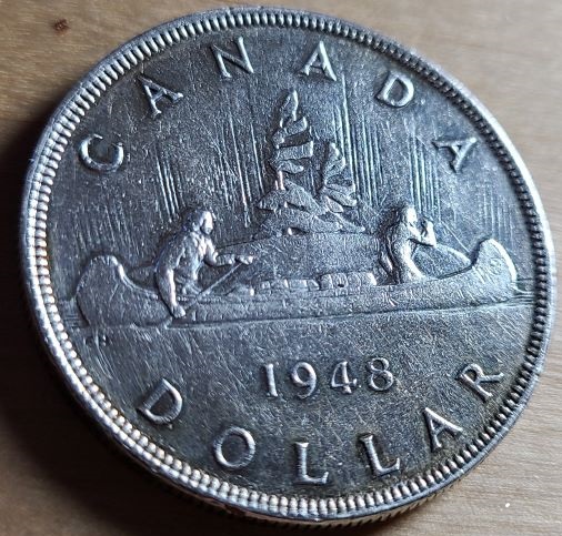 Help-With-Authenticating-This-1948-Silver-Dollar?
