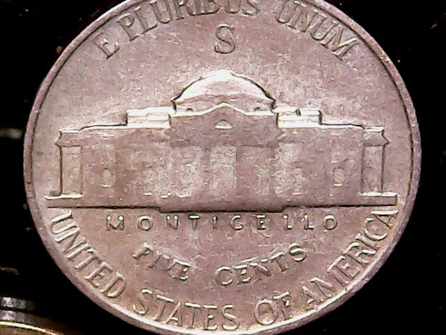 1944-S-War-Nickel-W/Rifle-Shaped-Strike-Through-Error.