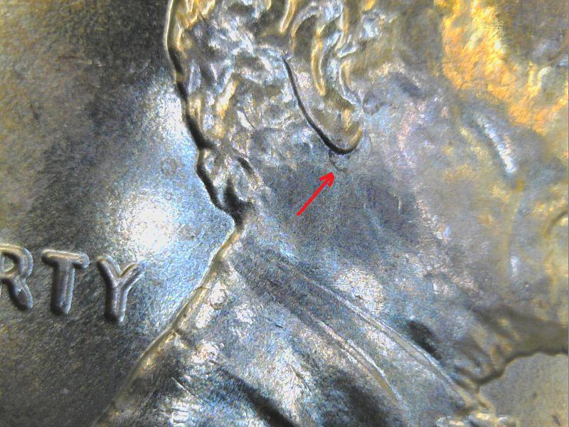 2018-Penny-Mark-Next-To-The-Ear-What-Is-It?