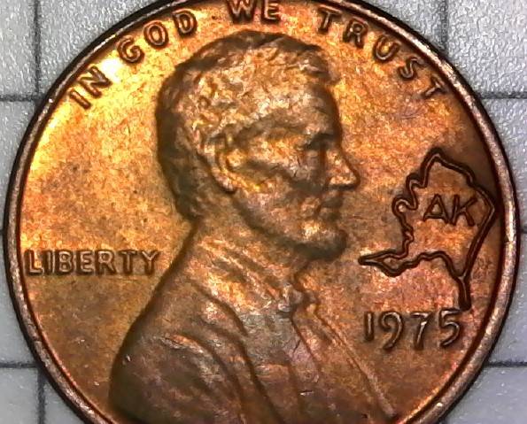 1975-Penny-With-An-Alaska-AK-State-Stamped-In-It