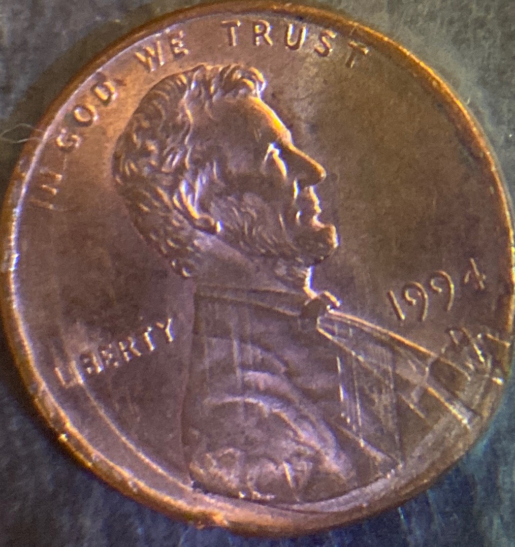1994-D-Penny-With-Other-Coins-Stamp
