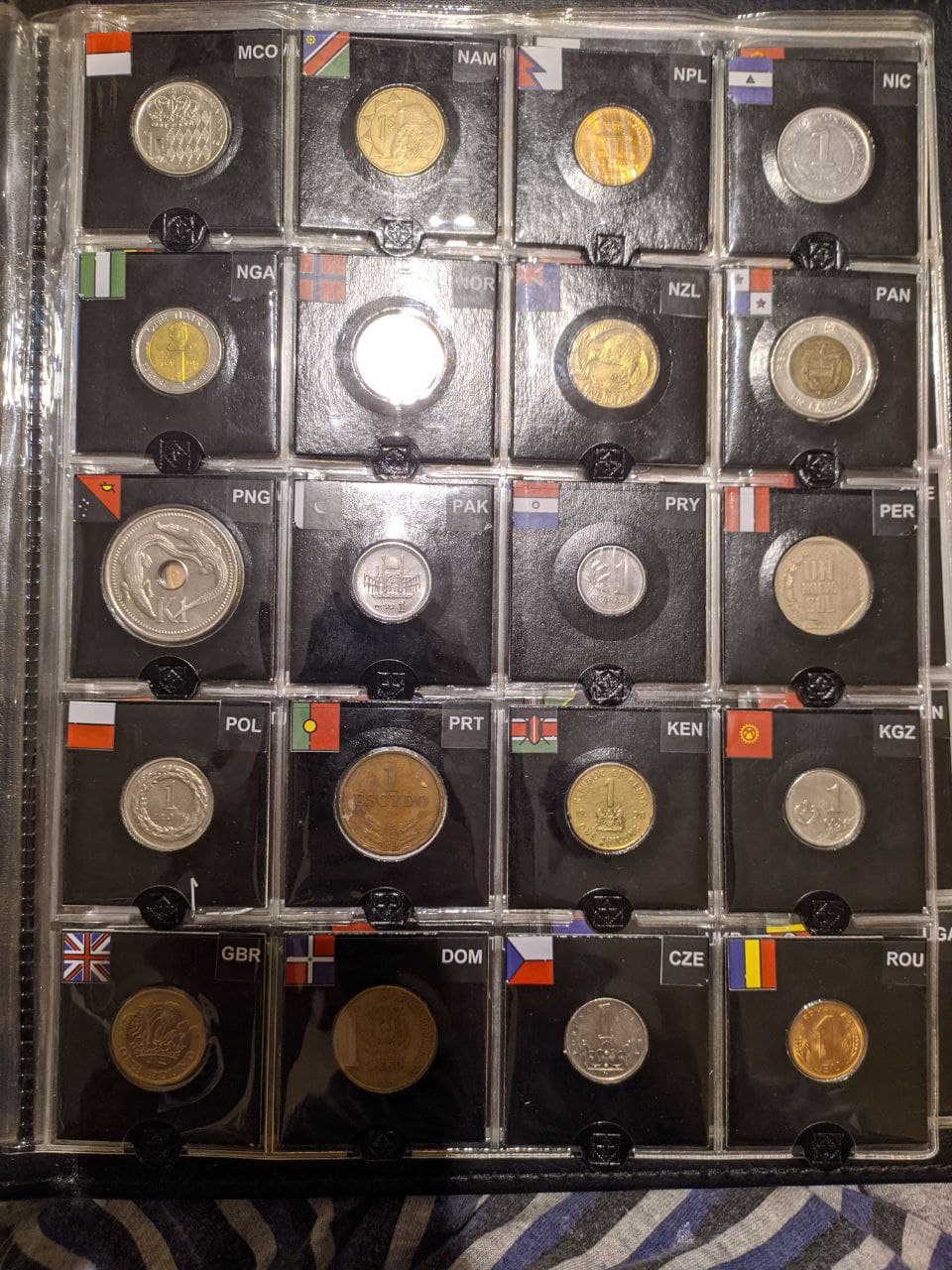 Trying-To-Collect-$1-Coins-From-Around-The-World