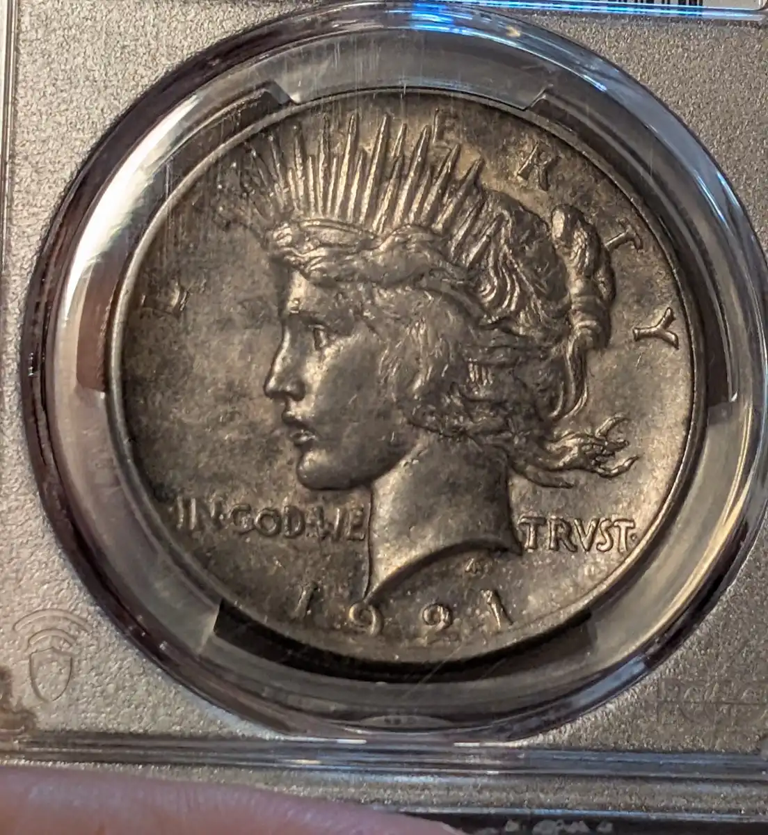 You-Vs-PCGS---1921-Gunmetal-Black-Toned-Peace-Dollar