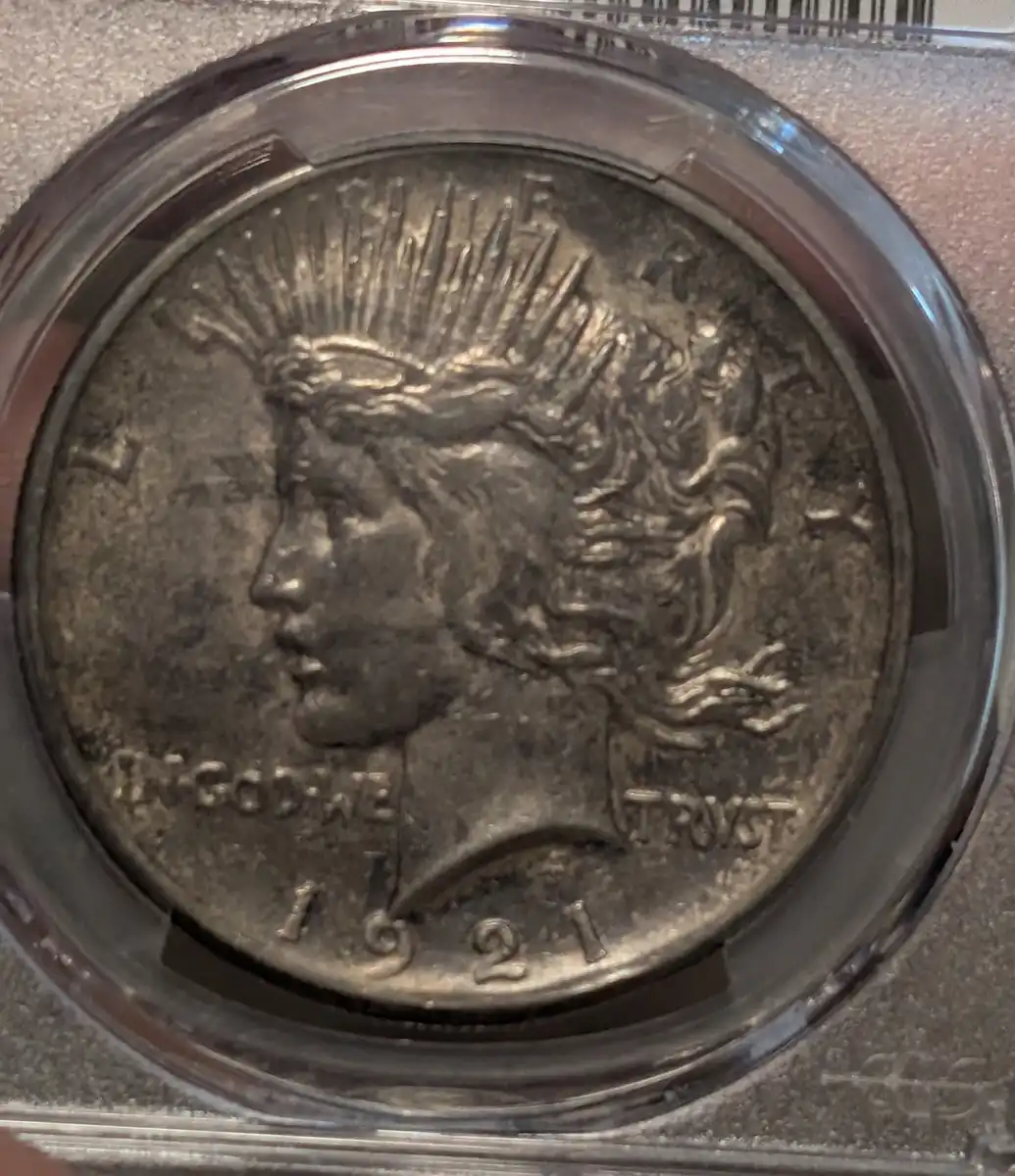 You-Vs-PCGS---1921-Gunmetal-Black-Toned-Peace-Dollar