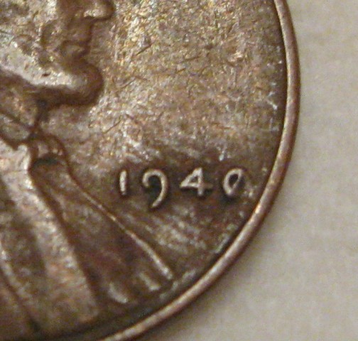 1940-Lincoln-Memorial-Cent-With-A-Line-Through-The-O
