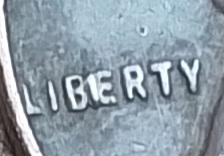 1957-Wheat-Penny-No-Mint-With-Die-Break-In-Liberty.-I-Think