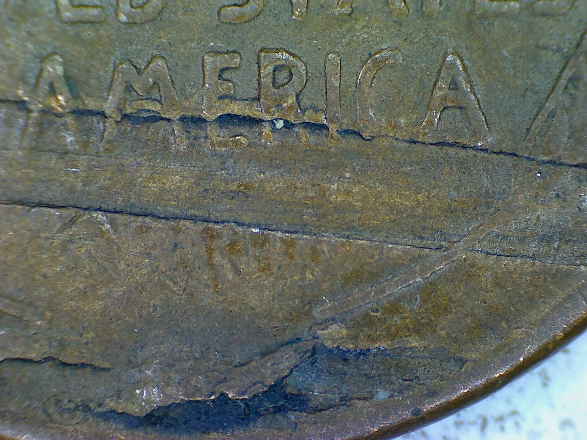 Does-The-Reverse-Of-This-1946-Penny-Have-A-Strike-Thru-Or-Is-It-PMD?
