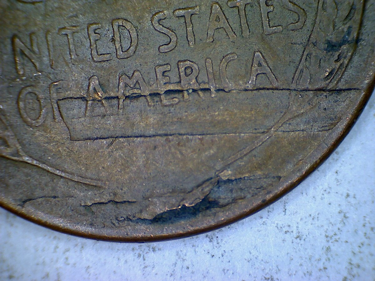 Does-The-Reverse-Of-This-1946-Penny-Have-A-Strike-Thru-Or-Is-It-PMD?