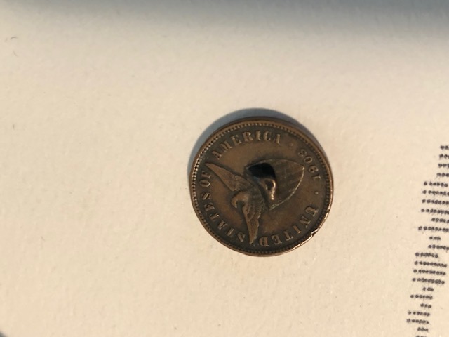 Strange-Defect-On-1903-US-Philippines-Half-Cent