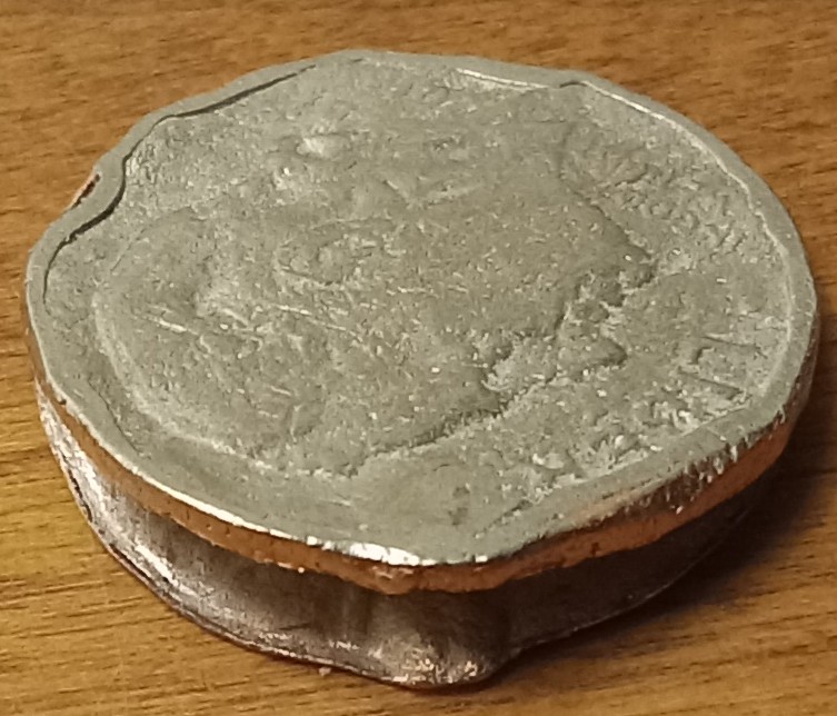 Totally-Damaged-2016-Dime---Yet-Very-Strange