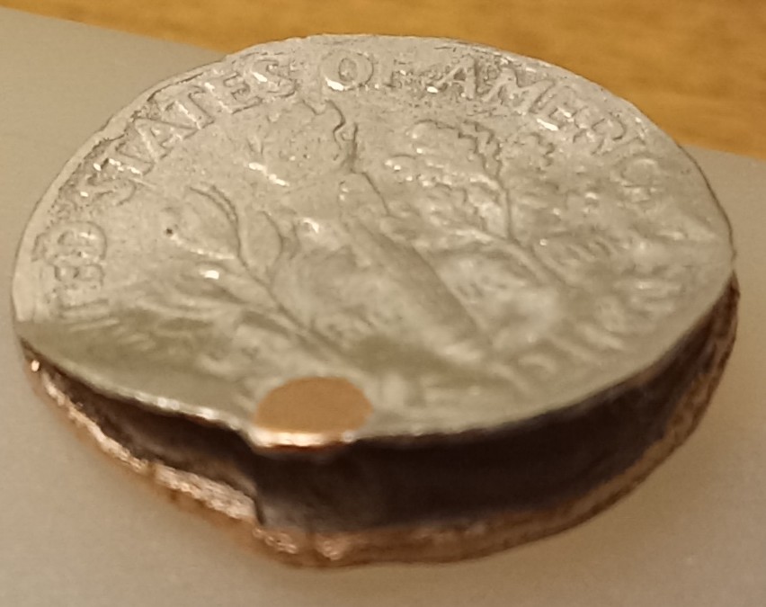 Totally-Damaged-2016-Dime---Yet-Very-Strange