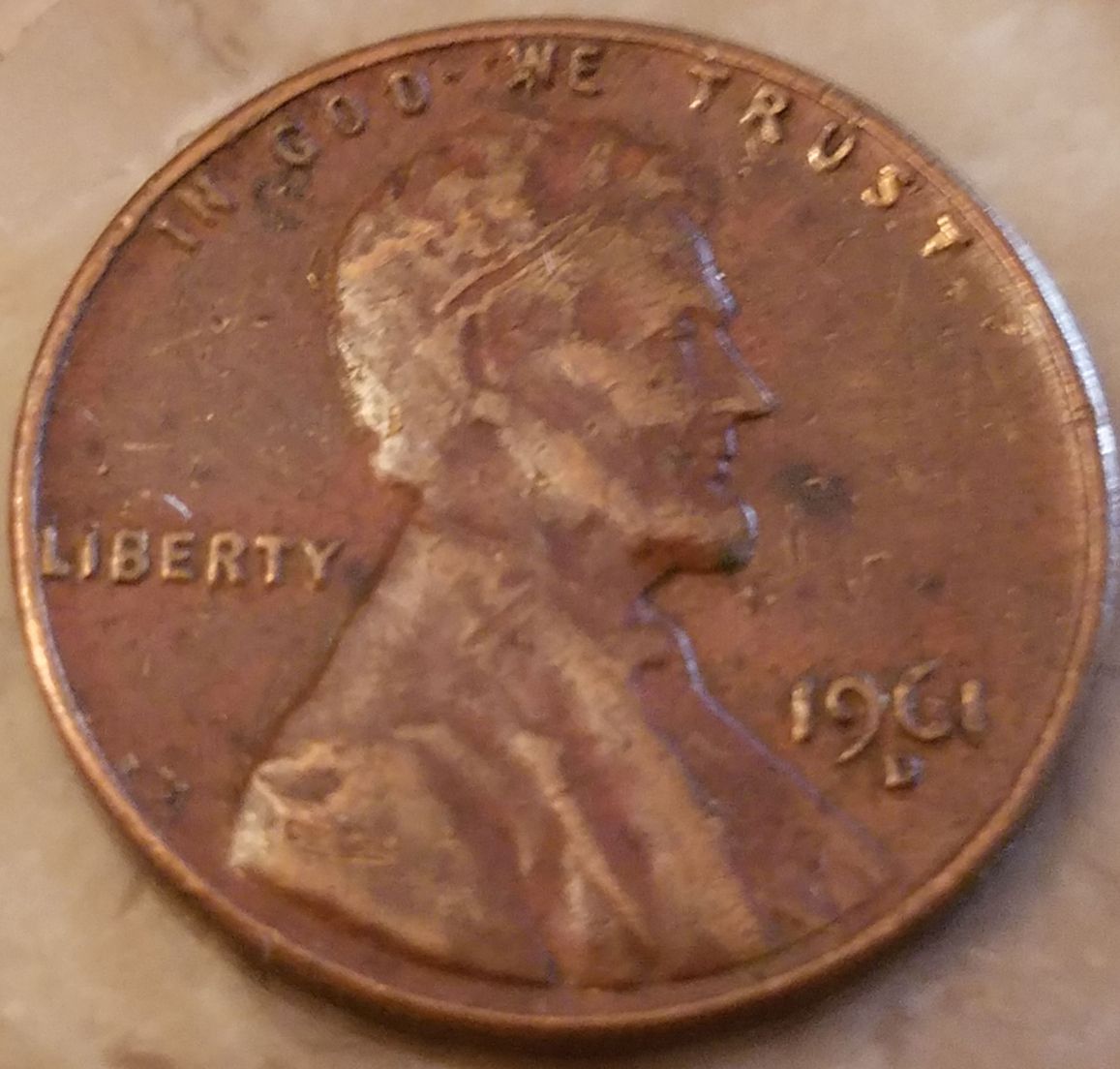 1961-Penny-With-A-Strike-Line