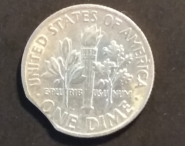 1961-10c-Clip-Found-On-Sunday