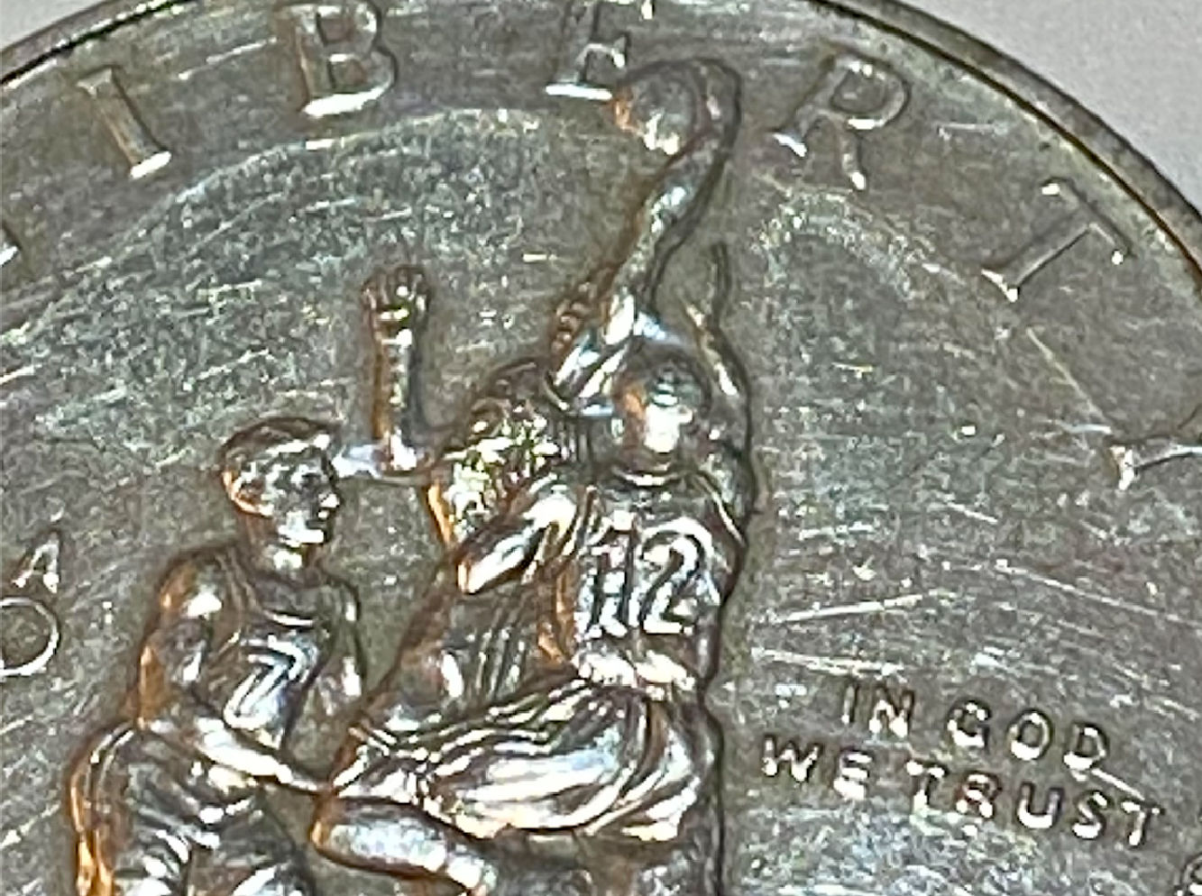 What's-On-This-1995-S-Olympic-Basketball-Half-Dollar?-An-Error?