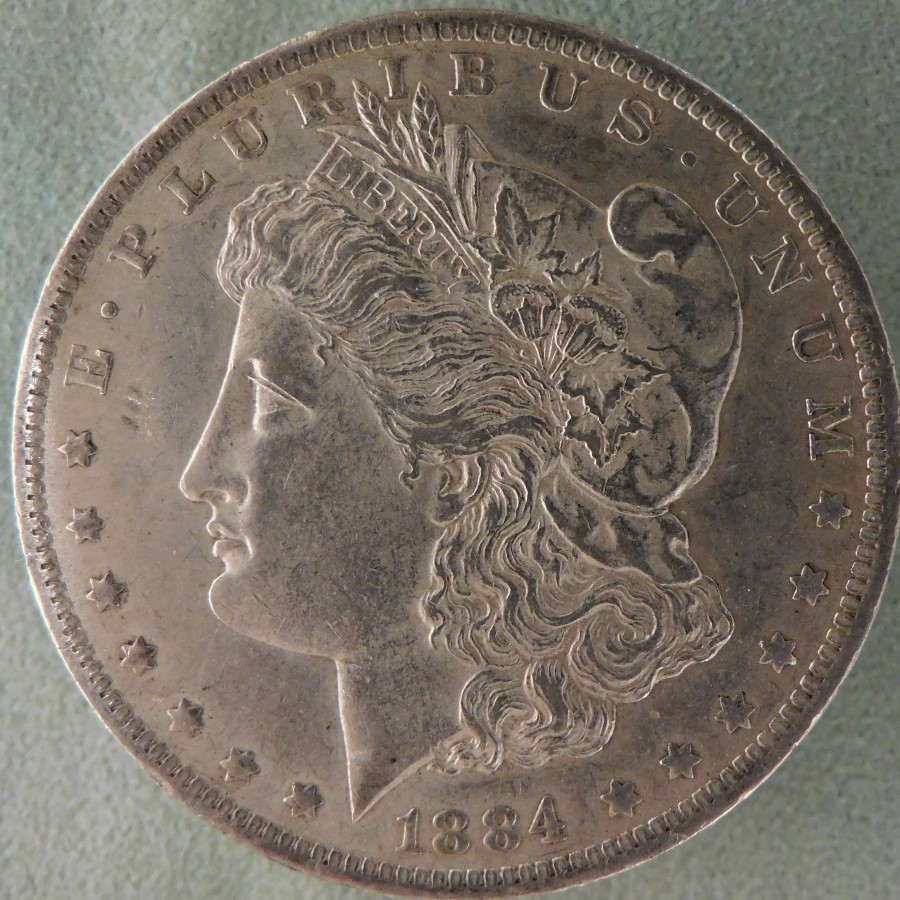Morgan-1884-O-7TF-Saf-X-Fine