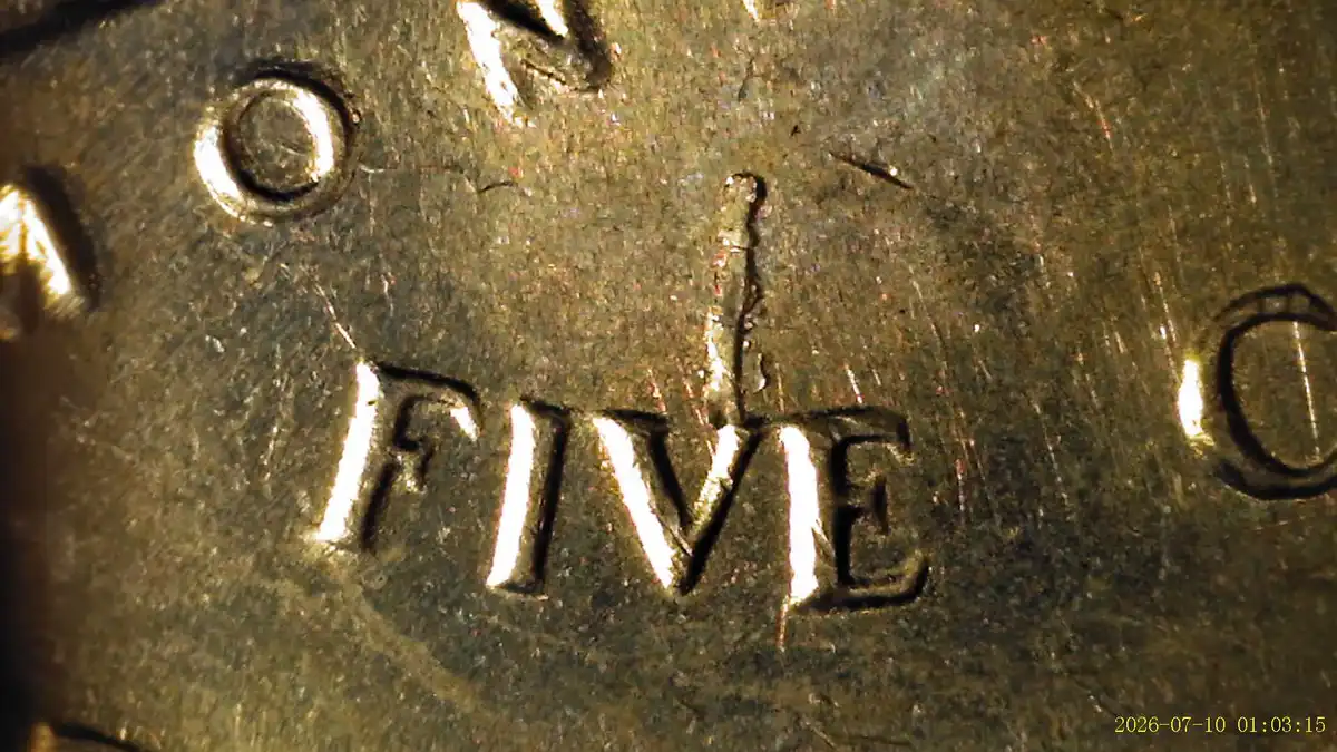 1968-S-Nickel-Retained-Struck-Thru-Inner-Rim-Fragments?