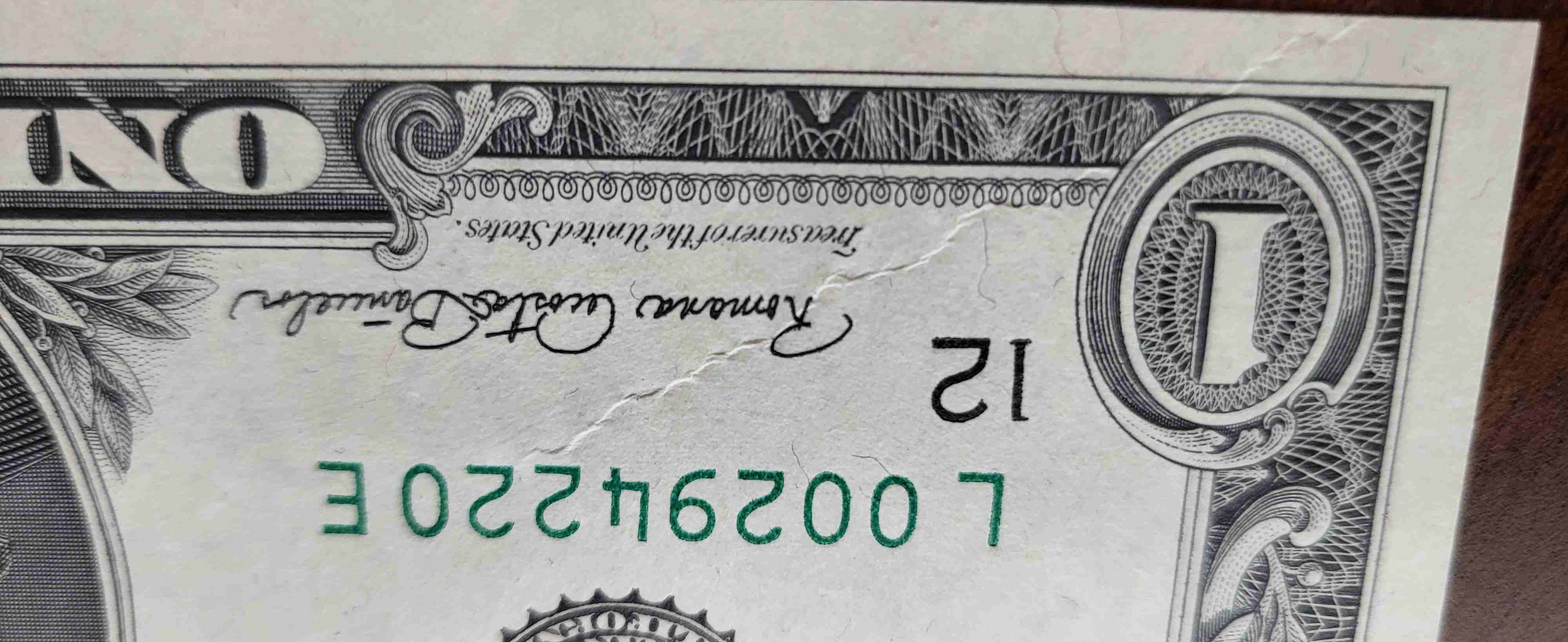 1969-D-$1-Error-With-String-In-Paper
