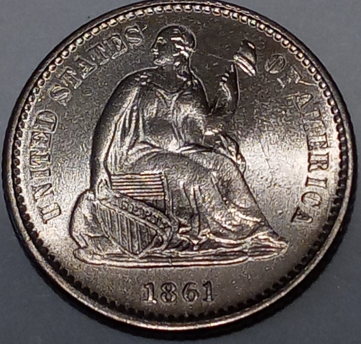 On-A-1861-Half-Dime,-Yikes-Grade!