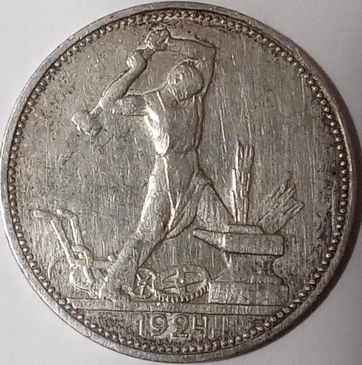 Post-Your-Coins-Or-Medals-With-Industrial-Imagery
