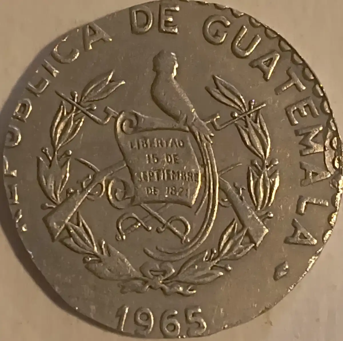 Guatemala-1965-25-Centavos-Perplexing-Error-Or-PMD?