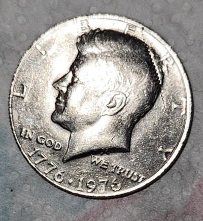 1976-Kennedy-Half-Dollar-Obverse-Error-Or-PMD?