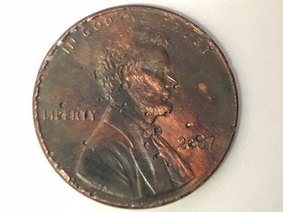 2007-Penny-Multiple-Holes-On-Front-And-Back-Error-Or-Damage?