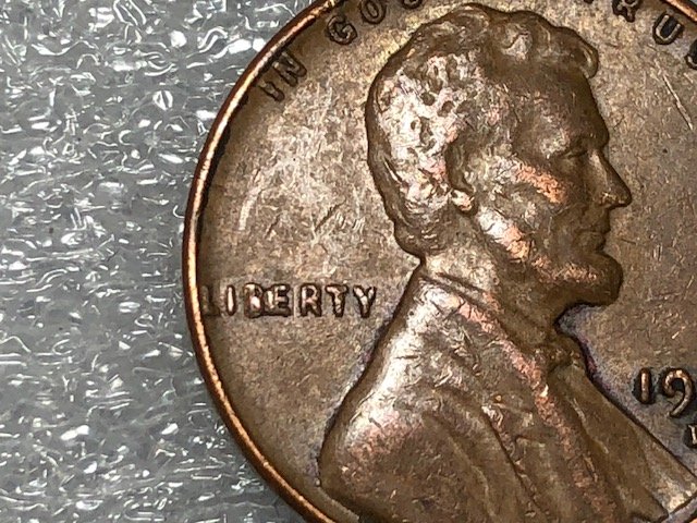 1957-D-One-Cent-Die-Chips-On-Liberty