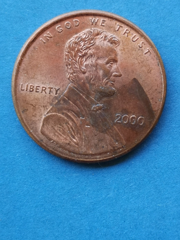 Mis-Stamped-Reverse-Of-Coin.-Lettering-States-&-Of.-Close-AM-2000-Cent