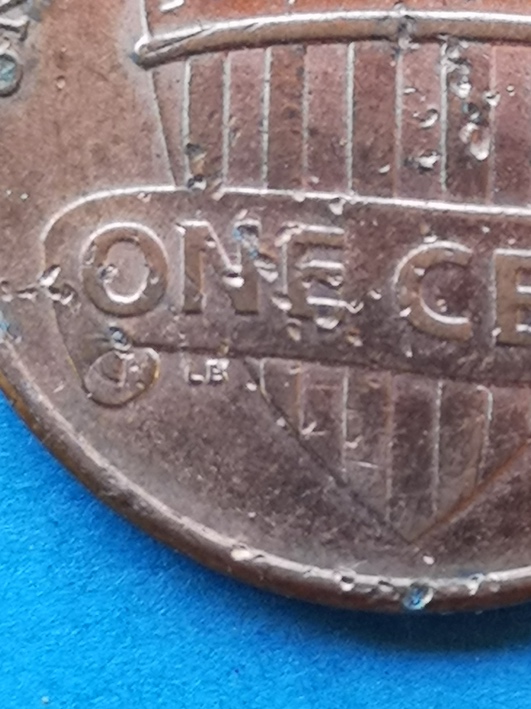Lincoln-Cent-2013.reverse-Mis-Stamp-Or-Just-Damage