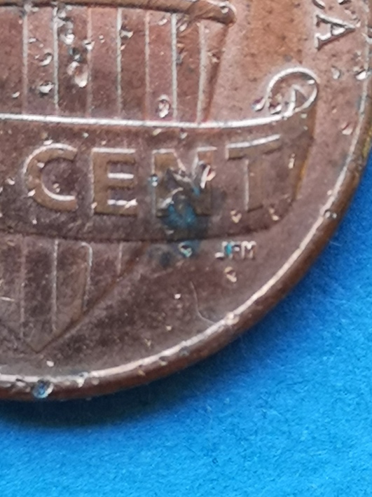 Lincoln-Cent-2013.reverse-Mis-Stamp-Or-Just-Damage