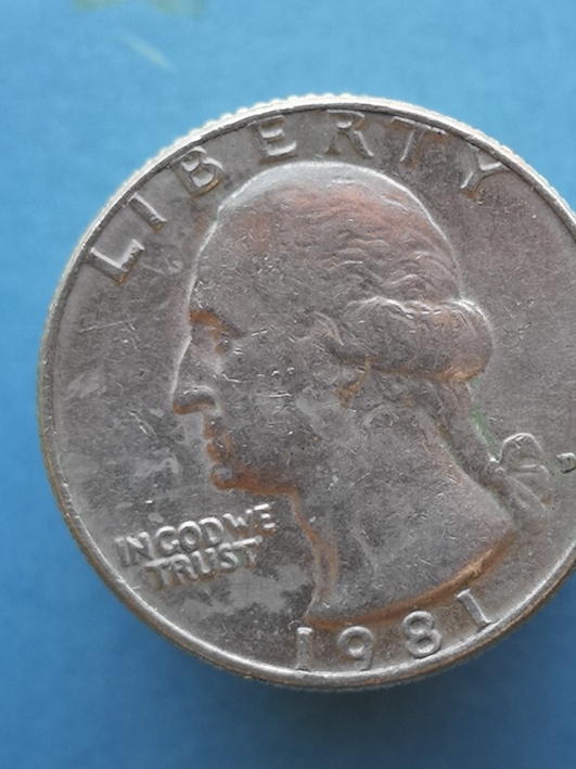1981-D-Mint-Quarter-Dollar.damage-To-Reverse-By-Die-?