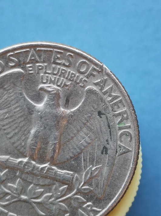 1981-D-Mint-Quarter-Dollar.damage-To-Reverse-By-Die-?