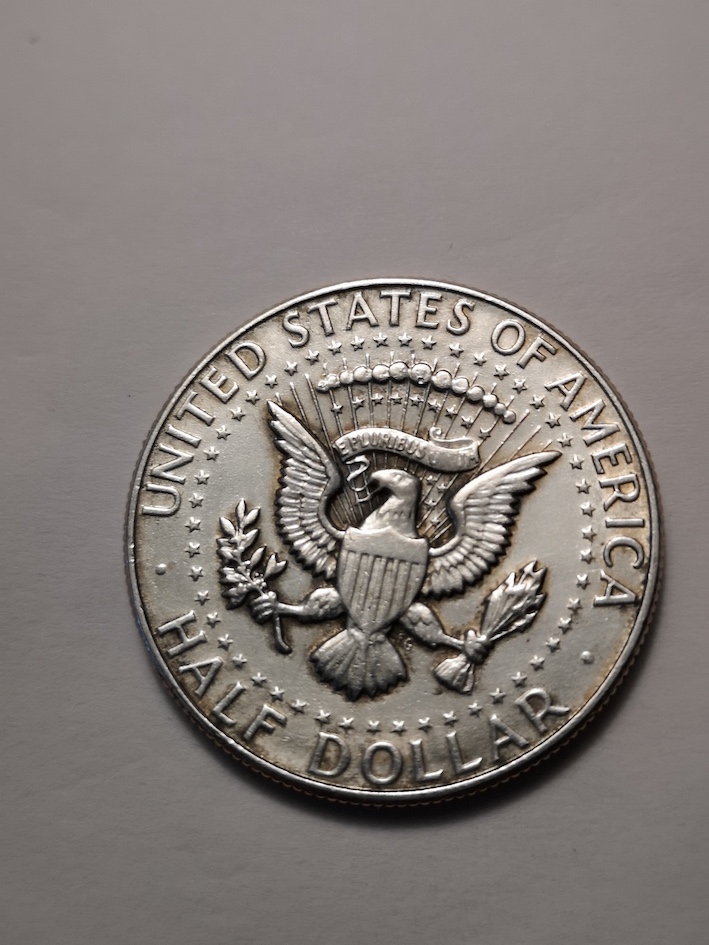 Kennedy-Half-Dollar.1968.error-.unum.+-First-Line-With-Star
