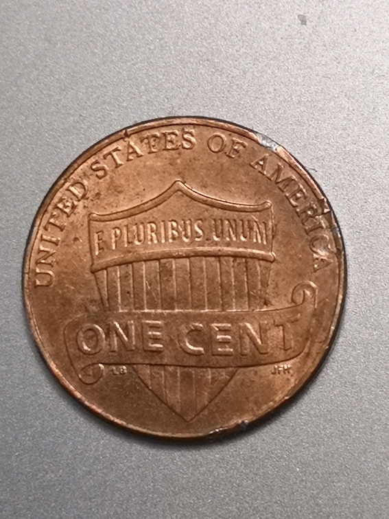 2015-Red-Cent.error-Or-Damage-To-Rim-With-Loss-Of-L