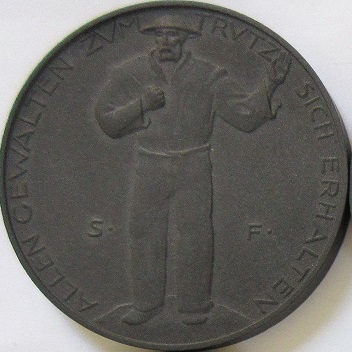 Notgeld-Coins-Made-From-Compressed-Coal-Dust-Along-With-Porcelain-Ones!